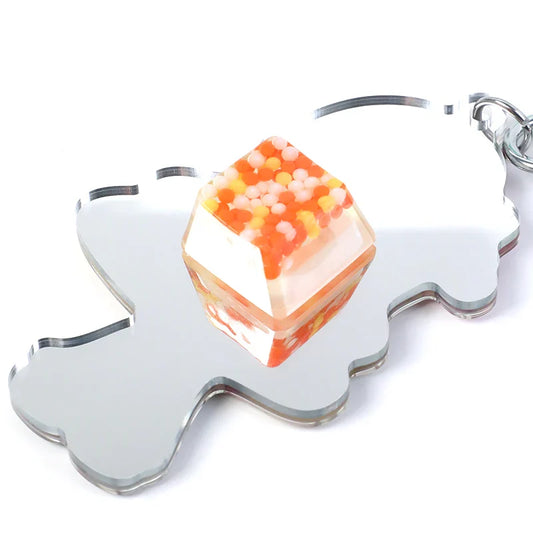 Custom acrylic mirror keychain with a colorful resin keycap and bubble design