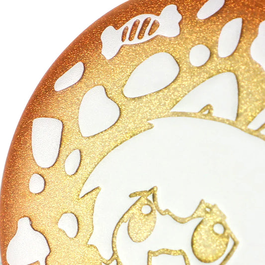 Close-up of a custom 3D glitter holographic button pin with gold and white cartoon details