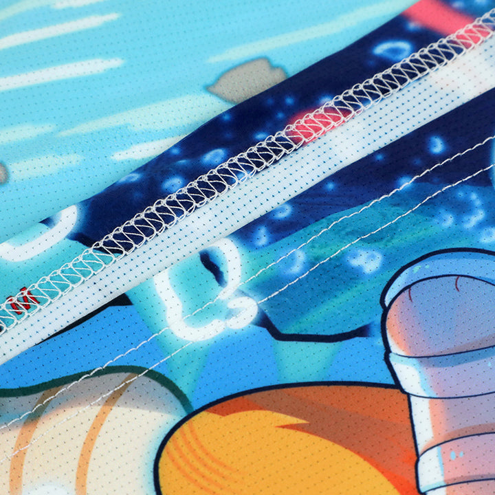 Close-up of a custom full-print quick dry T-shirt with colorful anime illustration and visible stitching detail.