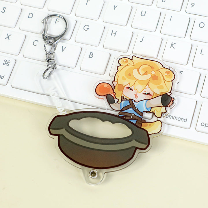 Custom multi-layer acrylic keychain with cute anime character and pot on a keyboard