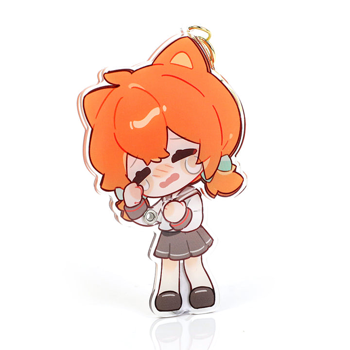Custom multi-layer acrylic keychain featuring a chibi anime girl with orange hair and school uniform