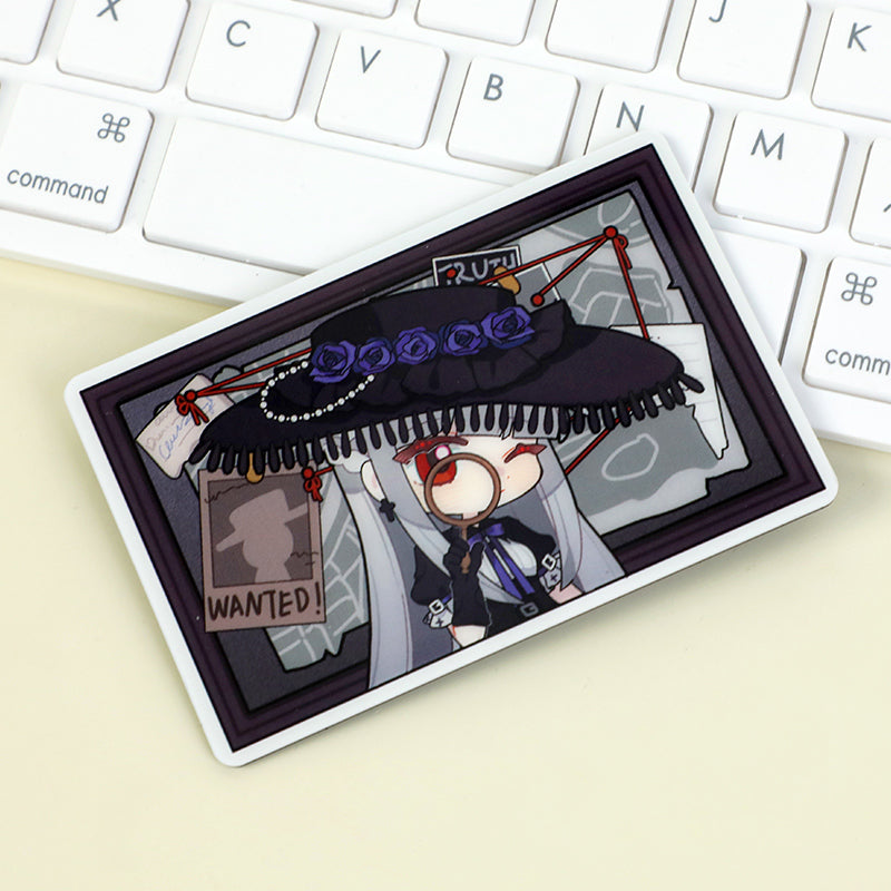 Custom acrylic fridge magnet featuring anime detective character near keyboard