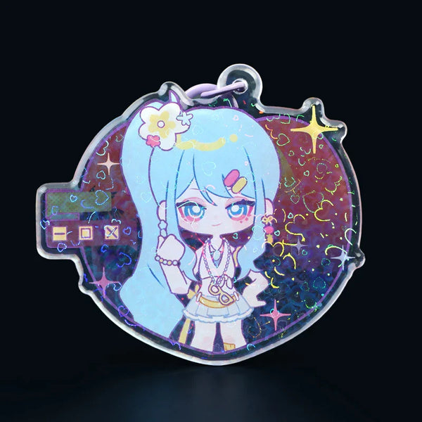 Custom acrylic keychain with holographic anime girl character, blue hair, and decorative glitter.