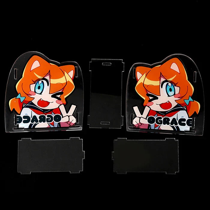 Custom acrylic pen holder parts with orange anime cat mascot, separated on black background